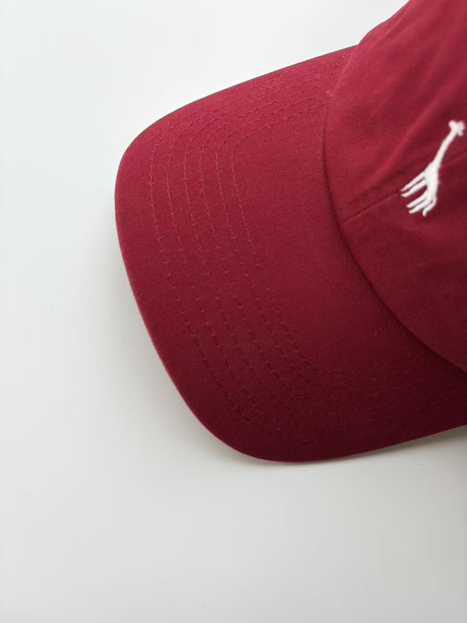 Red Baseball Cap with Embroidered Giraffe Logo